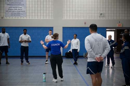 A U.S. Air Force expert fitness specialist talks with students while attending the Master Fitness Leader course, February 24, 2026, at McGhee Tyson Air National Guard Base, Tennessee. The I.G. Brown Training and Education Center hosted the inaugural Master Fitness Leader course, bringing together Total Force Airmen and civilians for the first offering of the new training program.