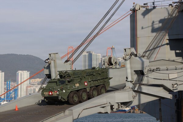 A Stryker armored vehicle assigned to rotational U.S. Army forces drives down the ramp of the USNS Watkins Feb. 4, 2026, at Pier 8 in Busan, South Korea.