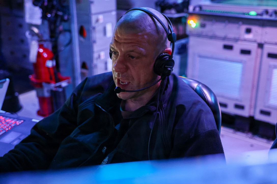 A U.S. Navy Sailor stands watch in the combat information center aboard Arleigh Burke-class guided-missile destroyer USS John Finn (DDG 113) in the U.S. Central Command area of responsibility in support of Operation Epic Fury, Mar. 08, 2026. (U.S. Navy photo)