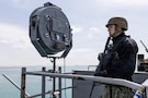 A U.S. Sailor stands small craft action team watch on a catwalk aboard the world’s largest aircraft carrier, USS Gerald R. Ford (CVN 78), while transiting the Suez Canal, March 5, 2026. (U.S. Navy photo)