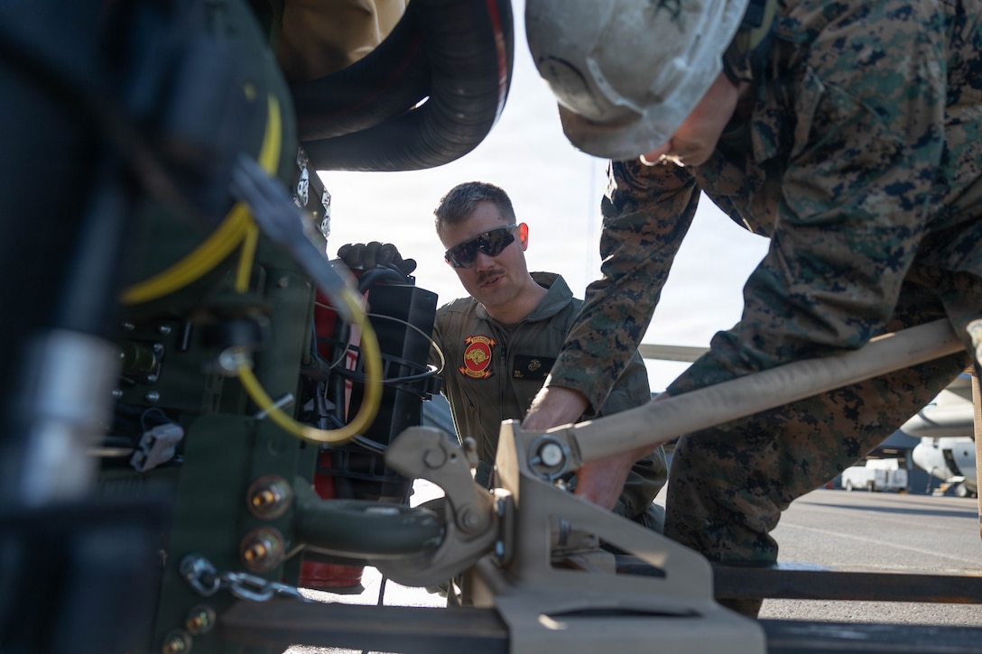U.S. Marine Corps 1st Lt. Richard Jethon, a logistics officer with Marine Wing Support Squadron (MWSS) 273, Marine Air Control Group 28, 2nd Marine Aircraft Wing, supervises preparations to load a Tactical Air-Ground Refueling System at Rygge Air Base, Norway, March 5, 2026. The squadron loaded the TAGRS into a KC-130J Super Hercules aircraft during training for exercise Cold Response 26. A key component of NATO's enhanced vigilance activity Arctic Sentry, exercise Cold Response 26 is a Norwegian-led winter military exercise designed to enhance collective defense capabilities and ensure U.S. readiness to rapidly deploy and seamlessly operate alongside NATO Allies in challenging arctic conditions. Jethon is a native of Pennsylvania. (U.S. Marine Corps photo by Cpl. Mya Seymour)