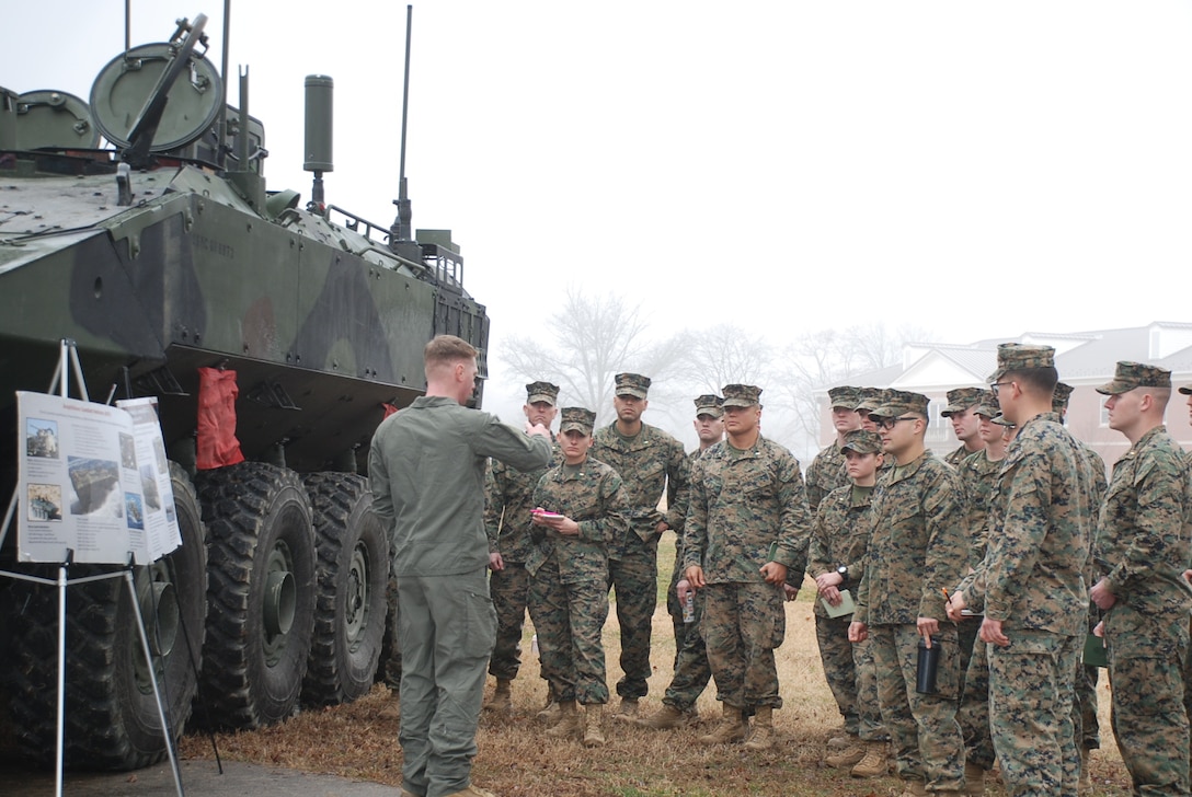 Marine Corps Systems Command, Program Office of Advanced Amphibious Assault, speaks to students with Fox Company, Basic Officer Course 6-25 during Amphibious Combat Vehicle integration training at TBS on Marine Corps Base Quantico, Virginia, March 5, 2026. Students had the opportunity to speak with subject matter experts and observe the Amphibious Combat Vehicle—Command variant to learn more about the capabilities and limitations of the ACV-C and the rest of the family of vehicles, and how they will be implemented/operated within the Fleet Marine Force. (U.S. Marine Corps photo by Sgt. Myra Walker)