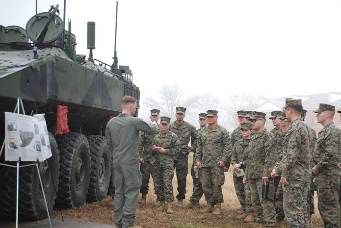 Marine Corps Systems Command, Program Office of Advanced Amphibious Assault, speaks to students with Fox Company, Basic Officer Course 6-25 during Amphibious Combat Vehicle integration training at TBS on Marine Corps Base Quantico, Virginia, March 5, 2026. Students had the opportunity to speak with subject matter experts and observe the Amphibious Combat Vehicle—Command variant to learn more about the capabilities and limitations of the ACV-C and the rest of the family of vehicles, and how they will be implemented/operated within the Fleet Marine Force. (U.S. Marine Corps photo by Sgt. Myra Walker)