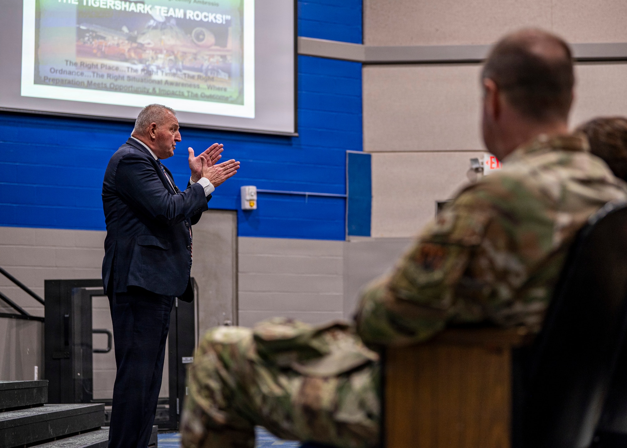 Retired U.S. Air Force Col. Raymond Strasburger delivers remarks during Saluting Our Aviation Roots (SOAR) Week at Moody Air Force Base, Georgia, Feb. 26, 2026. Speaking to members of Team Moody, he encouraged Airmen to uphold the standards of leadership and integrity passed down through generations. (U.S. Air Force photo by Senior Airman Leonid Soubbotine)