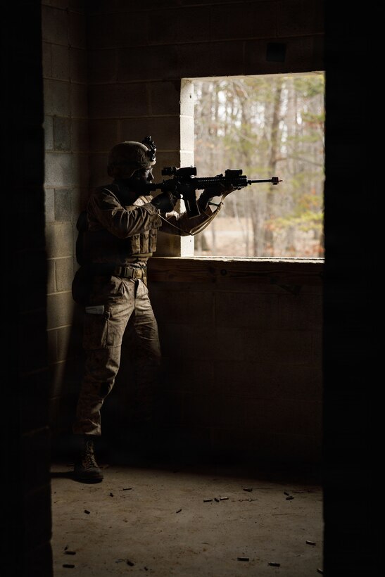 U.S. Marine Corps 2nd Lt. Jordan Mahotiere, a student with Company F, The Basic School, provides suppressive fire during a platoon attack at Marine Corps Base Quantico, Virginia, Feb. 25, 2026. The purpose of the simulated platoon attacks was to introduce Marines to the fundamentals of Military Operations on Urban Terrain training, evaluate their leadership in high-stress environments, and develop them into confident, provisional rifle platoon commanders. (U.S. Marine Corps photo by Cpl. Joshua Barker)