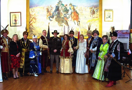 Col. Michael Kowalski, Commander of the 33rd Infantry Brigade Combat Team Illinois National Guard, poses with members of the Rooster Society at the Polish Museum of America in Chicago.