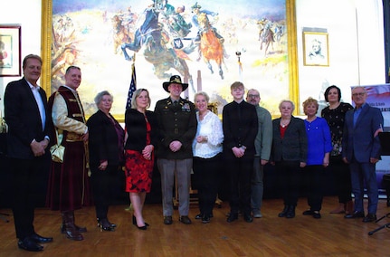 Col. Michael Kowalski, Commander of the 33rd Infantry Brigade Combat Team Illinois National Guard, poses with teachers from Polish Saturday Schools at the Polish Museum of America.