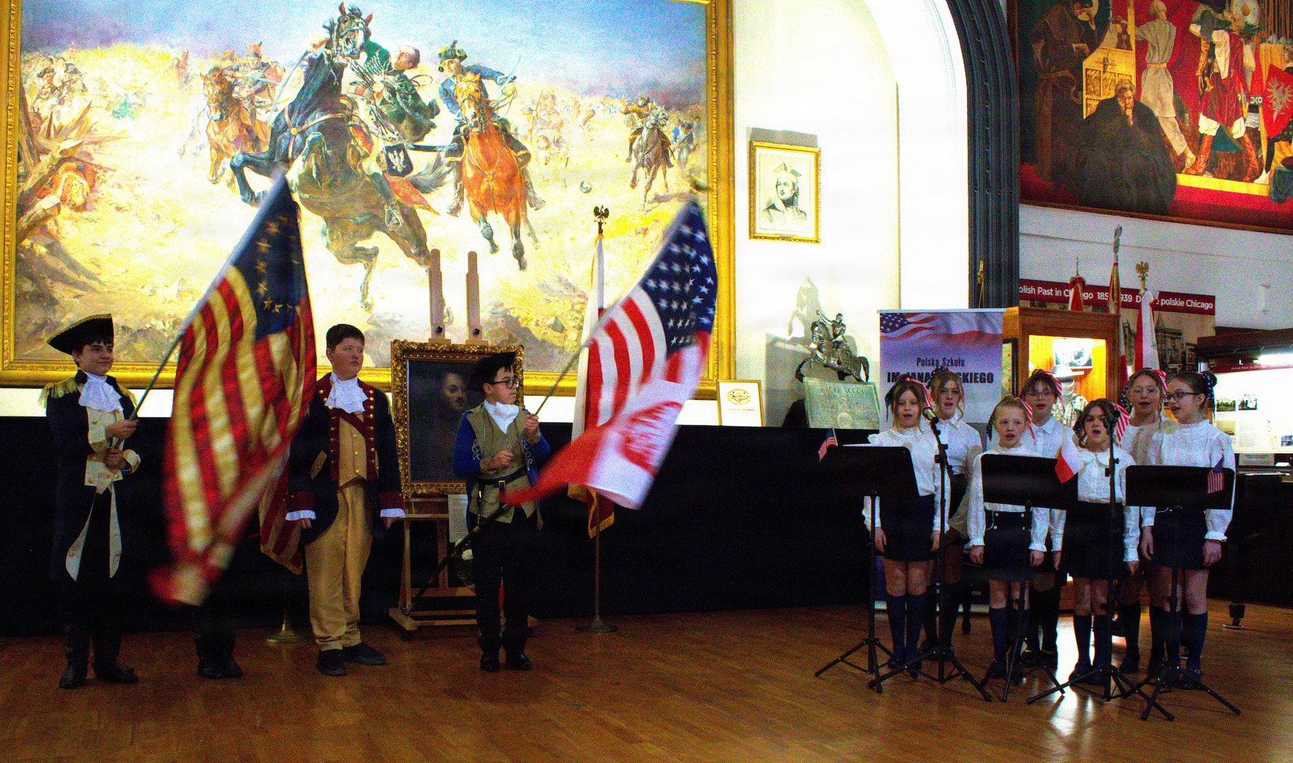 Students of the Jan Karski Polish School sing and perform in honor of Casimir Pulaski at the Polish Museum of America in Chicago.