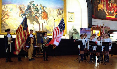 Students of the Jan Karski Polish School sing and perform in honor of Casimir Pulaski at the Polish Museum of America in Chicago.