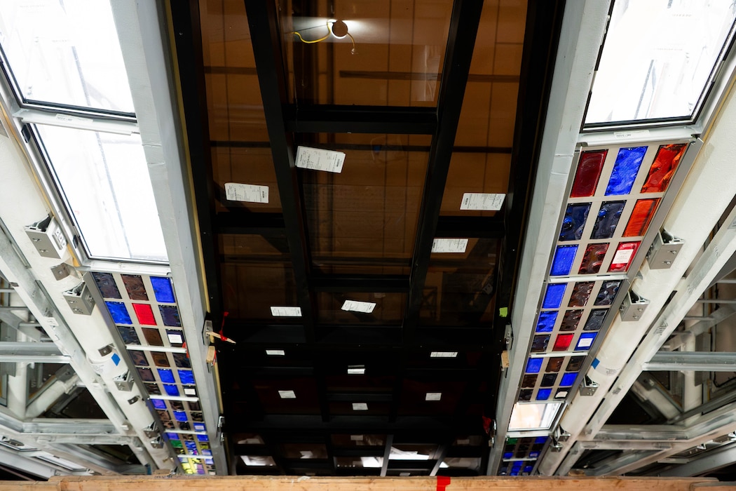 U.S. AIR FORCE ACADEMY, Colo. – Restoration specialists carefully reinstall the first of 2,240 cassettes with more than 24,000 individual dalles de verre blocks, commonly referred to as stained glass panels, inside the U.S. Air Force Academy Cadet Chapel. The installation is part of the on-going Air Force Installation and Mission Support Center-led Chapel restoration project. The Air Force Civil Engineer Center, an AFIMSC primary subordinate unit, is executing the restoration activities.
