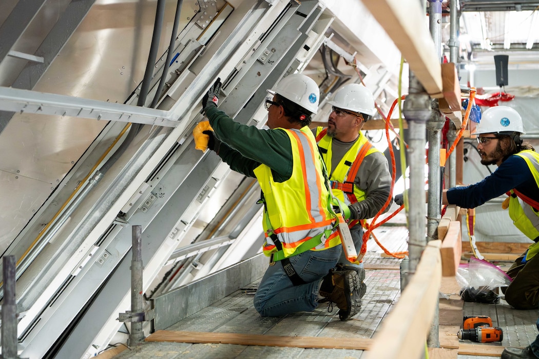 U.S. AIR FORCE ACADEMY, Colo. – Restoration specialists carefully reinstall the first of 2,240 cassettes with more than 24,000 individual dalles de verre blocks, commonly referred to as stained glass panels, inside the U.S. Air Force Academy Cadet Chapel. The installation is part of the on-going Air Force Installation and Mission Support Center-led Chapel restoration project. The Air Force Civil Engineer Center, an AFIMSC primary subordinate unit, is executing the restoration activities.