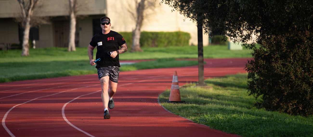 Airman runs along the track