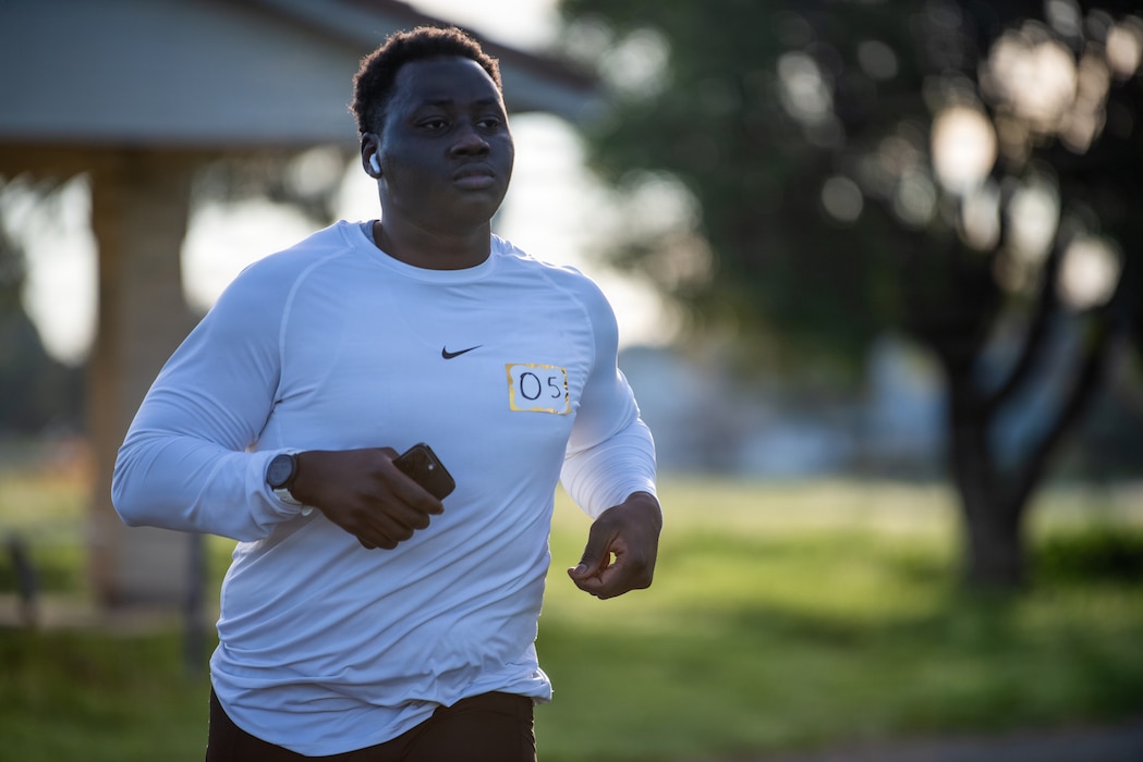 Airman runs throughout base housing