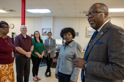 Gennaro Penn, U.S. Army Financial Management Command Military Pay Operations director, talks with Fort Knox Army Military Pay Office employees at Fort Knox, Ky., March 4, 2026. USAFMCOM’s leadership visited the Fort Knox AMPO during a major subordinate command update to the U.S. Army Materiel Command and thanked the employees for their hard work in supporting Soldiers and their families. (U.S. Army photo by Mark R. W. Orders-Woempner)