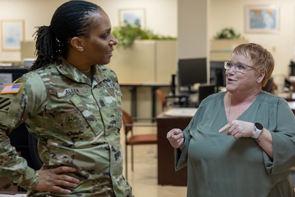 Command Sgt. Maj. Joy L. Allen, U.S. Army Financial Management Command senior enlisted adivosr, talks with Dawn Martin, USAFMCOM Fort Knox Army Military Pay Office quality review analyst, at Fort Knox, Ky., March 4, 2026. USAFMCOM’s leadership visited the Fort Knox AMPO during a major subordinate command update to the U.S. Army Materiel Command and thanked the employees for their hard work in supporting Soldiers and their families. (U.S. Army photo by Mark R. W. Orders-Woempner)