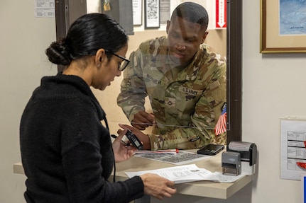 Sherrie Parks, U.S. Army Financial Management Command Fort Knox Army Military Pay Office military pay technician, provides support to Pvt. 1st Class J’Beau Rougier at Fort Knox, Ky., March 3, 2026. USAFMCOM’s AMPOs perform installation-level military pay support for the Army across the United States, Korea and Japan. (U.S. Army photo by Mark R. W. Orders-Woempner)
