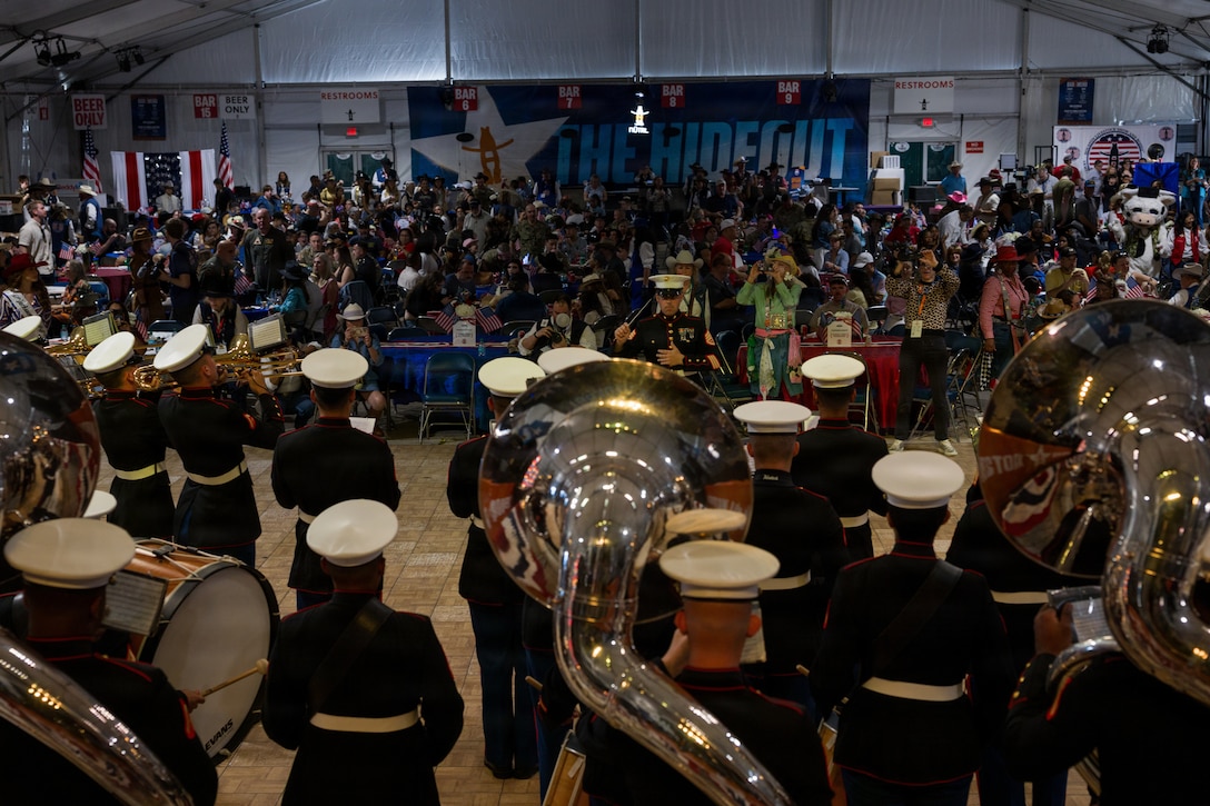 The Marine Forces Reserve Band performs for servicemembers and veterans at the Houston Livestock Show and Rodeo Armed Forces Appreciation Day in Houston, March 4, 2026. Armed Forces Appreciation Day honored nearly 4,000 military personnel and veterans, including a joint service enlistment ceremony for approximately 500 recruits. (U.S. Marine Corps photo by SSgt. Ethan M. LeBlanc)