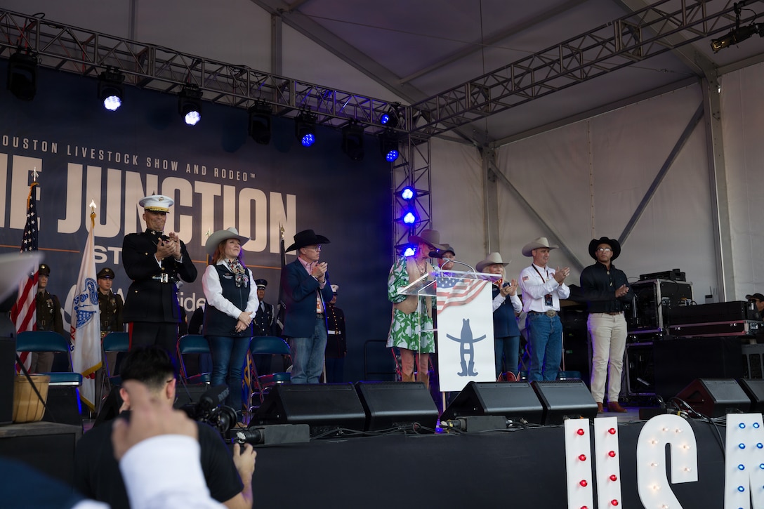 U.S. Marine Corps Lt. Gen. Leonard F. Anderson IV, far left, commander of Marine Forces Reserve and Marine Forces South, and leaders of the Houston Livestock Show and Rodeo honor service members past and present in Houston, March 4, 2026. Armed Forces Appreciation Day honored nearly 4,000 military personnel and veterans, including a joint service enlistment ceremony for approximately 500 recruits. (U.S. Marine Corps photo by SSgt. Ethan M. LeBlanc)