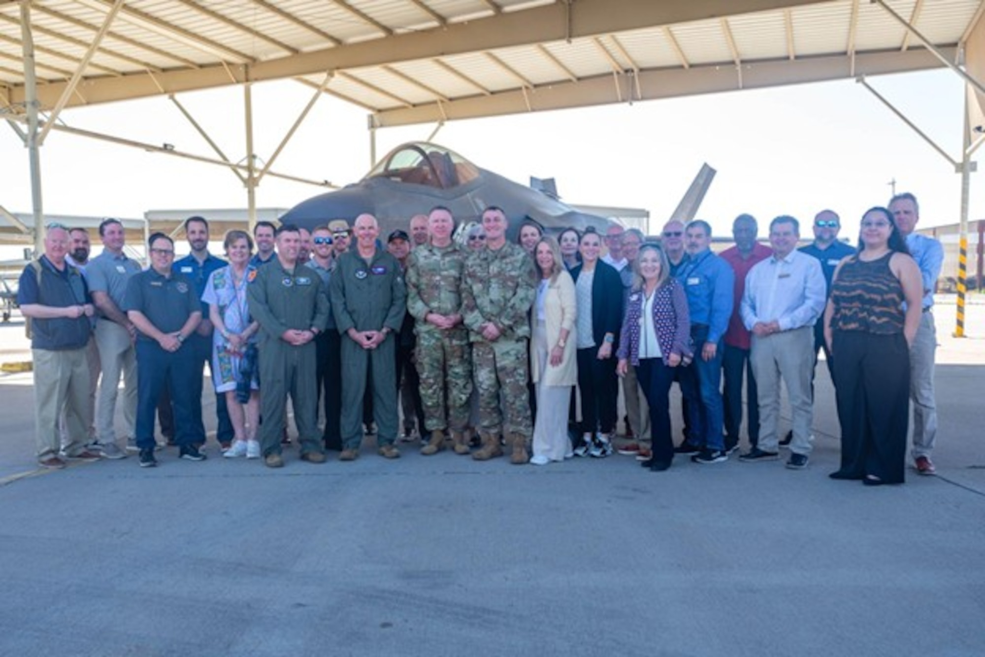 Air Education and Training Command leadership and civic leaders pose for a photo in front of an F-35A Lightning II, Feb. 26, 2026, at Luke Air Force Base, Arizona. Throughout the visit, civic leaders engaged directly with Airmen across multiple mission sets, including human performance specialists at the Tactical Integrated Training and Nutrition Arena and instructors at the F-35 Academic Training Center. These interactions provided insight into how AETC develops Airmen not only as technical experts but as resilient leaders prepared for the demands of modern warfare.