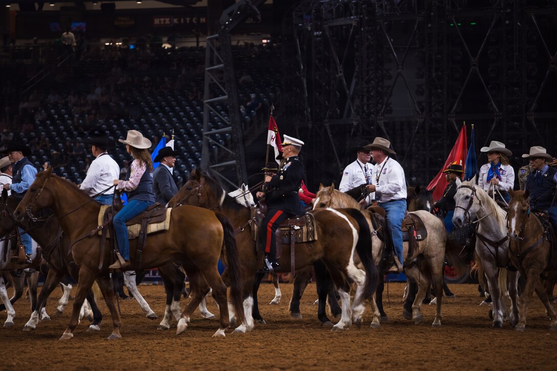 U.S. Marine Corps Lt. Gen. Leonard F. Anderson IV, commander of Marine Forces Reserve and Marine Forces South, rides into the main rodeo arena during the Houston Livestock Show and Rodeo Grand Entry on Armed Forces Appreciation Day in Houston, March 4, 2026. The Armed Forces Appreciation Day is a display of community support for the military, the participation of the commander and senior enlisted leader in the Grand Entry underscores the significance of this day and the city's deep gratitude for the dedication of America's troops. (U.S. Marine Corps photo by SSgt. Ethan M. LeBlanc)