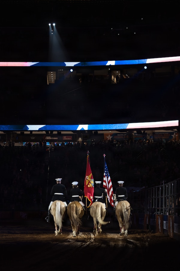 The U.S. Marine Corps Mounted Color Guard presents the colors during the playing of the National Anthem at the Houston Livestock Show and Rodeo Grand Entry on Armed Forces Appreciation Day in Houston, March 4, 2026. The participation of the last Marine mounted color guard in the Grand Entry, underscores the significance of this day and the city's deep gratitude for the dedication of America's troops. (U.S. Marine Corps photo by SSgt. Ethan M. LeBlanc)
