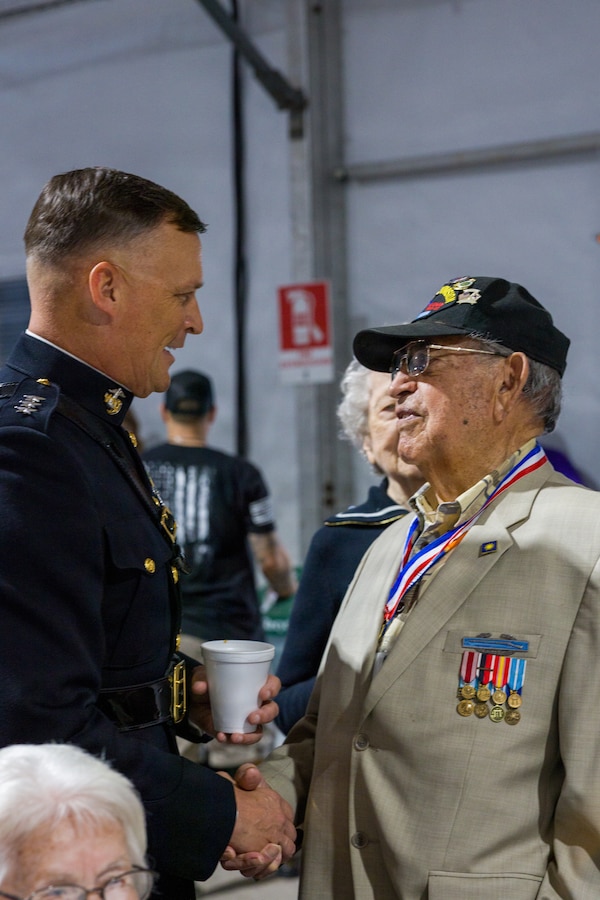 U.S. Marine Corps Lt. Gen. Leonard F. Anderson IV, commander of Marine Forces Reserve and Marine Forces South, talks with U.S. Army Pfc Roman Morales (Ret.), a Korean War veteran and member of the “Silent Generation”, at the Houston Livestock Show and Rodeo Armed Forces Appreciation Day in Houston, March 4, 2026. Armed Forces Appreciation Day honored nearly 4,000 military personnel and veterans, including a joint service enlistment ceremony for approximately 500 recruits. (U.S. Marine Corps photo by SSgt. Ethan M. LeBlanc)