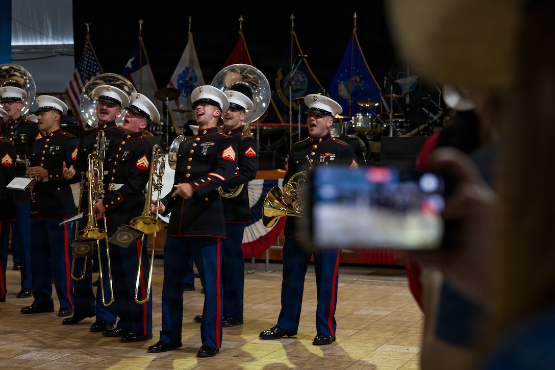 The Marine Forces Reserve Band performs for servicemembers and veterans at the Houston Livestock Show and Rodeo Armed Forces Appreciation Day in Houston, March 4, 2026. Armed Forces Appreciation Day honored nearly 4,000 military personnel and veterans, including a joint service enlistment ceremony for approximately 500 recruits. (U.S. Marine Corps photo by SSgt. Ethan M. LeBlanc)