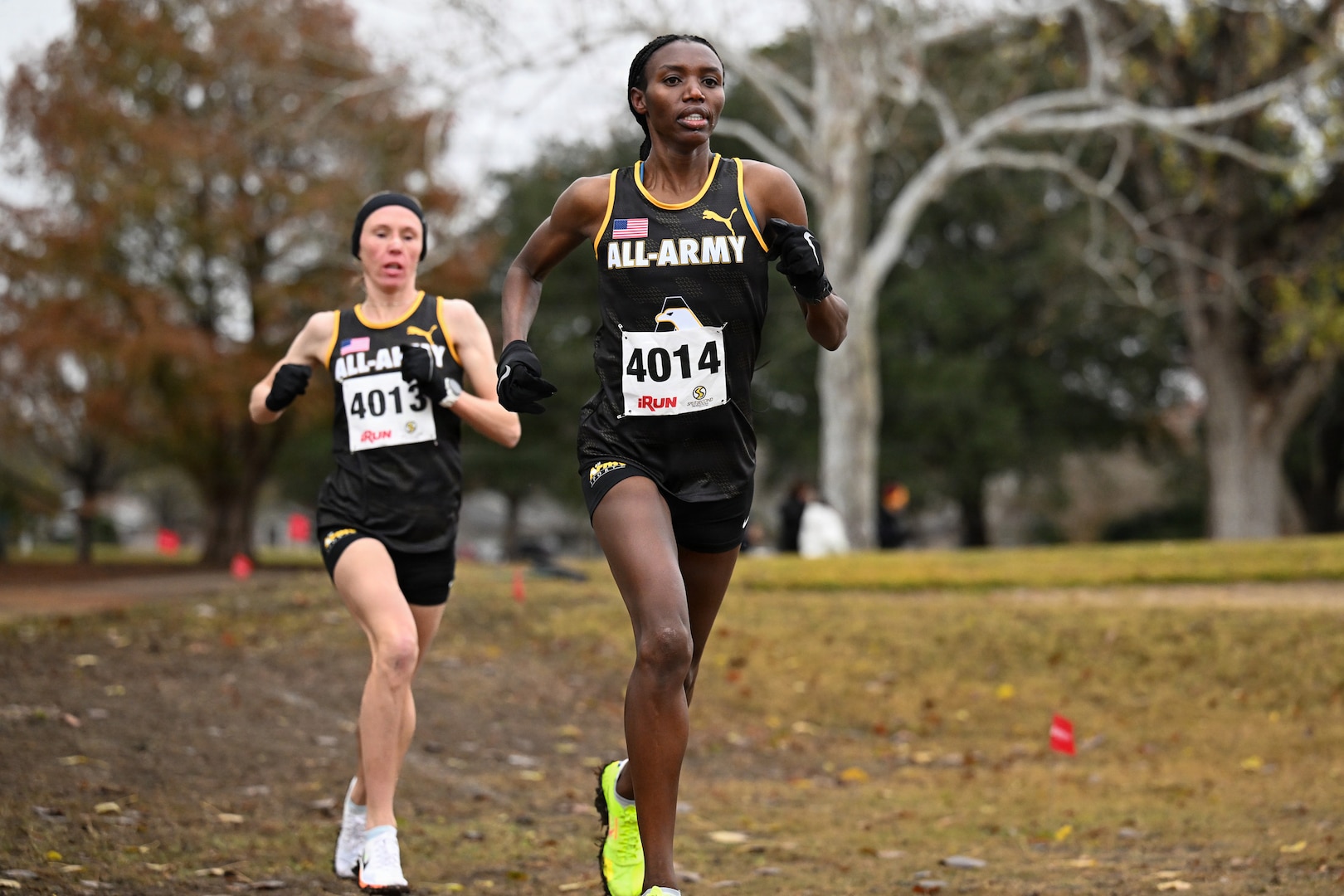 U.S. Army Sgt. Ednah Kurgat (right) and Staff Sgt. Colett Rampf-Cribbs (left), both stationed at Fort Carson, Colorado, compete during the Armed Forces Sports Cross Country Championships at Windcrest Golf Club in Windcrest, Texas, Jan. 24, 2026. The top finishers earn selection to represent the United States at the International Military Sports Council (CISM) World Winter Games in Trikala, Greece, scheduled for Feb. 25 through March 2, 2026.