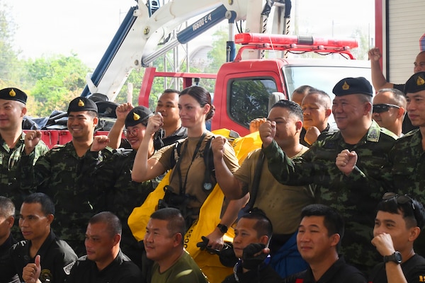 A group of participants pose for a photo after a chemical, biological, radiological, and nuclear response demonstration as a part of  Exercise Cobra Gold 2026 in Phanom Sarakham District, Chachoengsao, Thailand, Feb. 27, 2026.