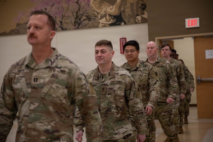 Soldiers assigned to the 145th Mobile Public Affairs Detachment, march into their welcome home ceremony held at the Armed Forces Reserve Center in Mustang, Oklahoma on March 7, 2026. The Soldiers deployed in support of U.S. Special Operations Command Europe, executing over 35 missions that showcased the specialized training of U.S. and allied special operations forces. (Oklahoma National Guard photo by Sgt. Cambrie Cannon)