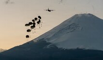 Japan Ground Self-Defense Force’s containerized delivery system bundles drop from a U.S. Air Force C-130J Super Hercules assigned to the 36th Airlift Squadron at JGSDF East Fuji Maneuver Area, Japan, March 4, 2026, during Airborne 26.