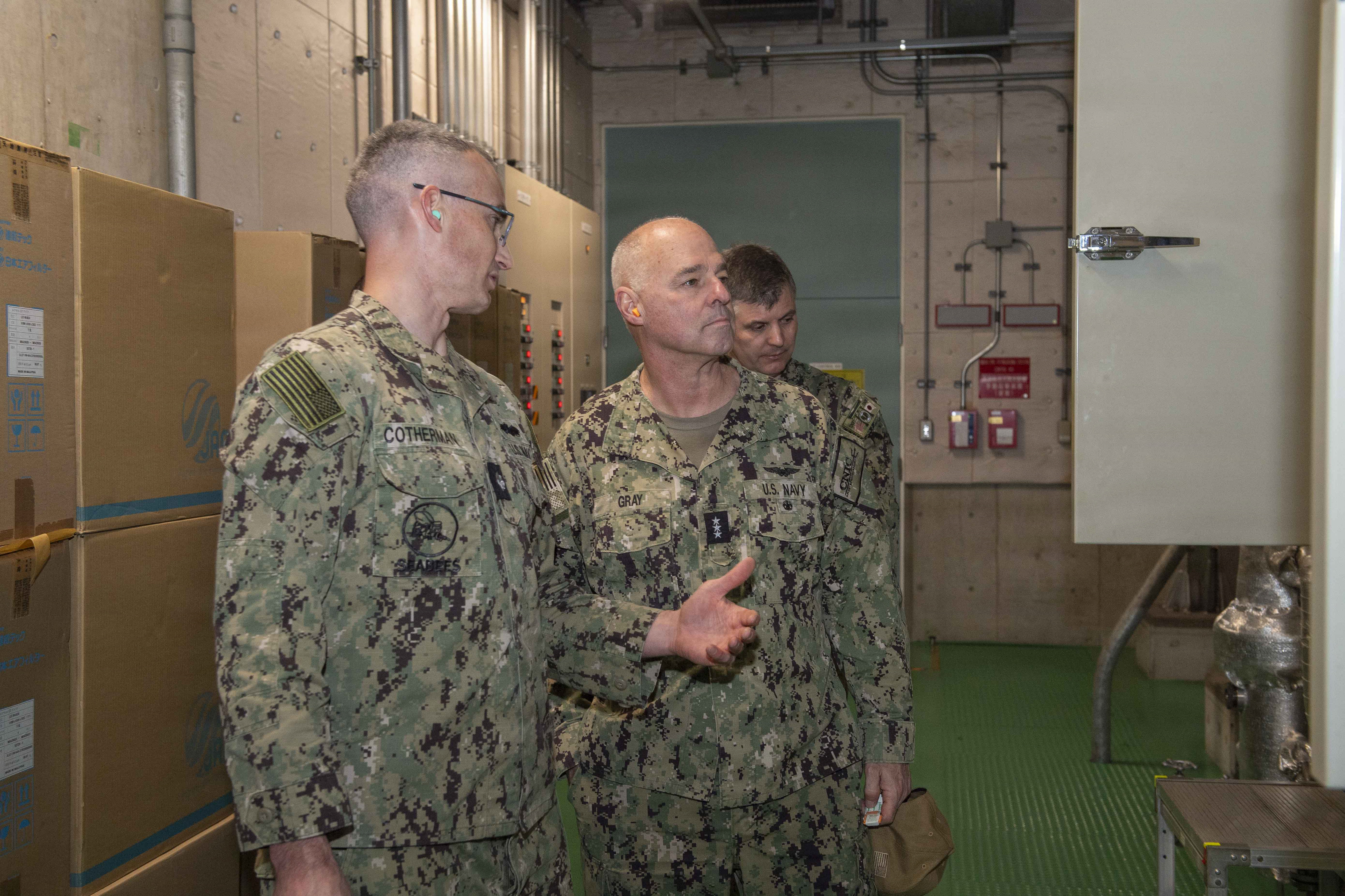 YOKOSUKA, Japan (Jan. 20, 2026) — Cmdr. Andrew Cotherman, public works officer for Commander, Fleet Activities Yokosuka (CFAY), speaks with Vice Adm. Scott Gray, Commander, Navy Installations Command (CNIC), during a tour of CFAY’s public works facilities. Gray’s visit focused on CNIC’s strategic priority to sustain the fleet by
maintaining and modernizing the critical infrastructure that supports global naval
operations. (U.S. Navy photo by Mass Communication Specialist 2nd Class Quinton A.
Lee)