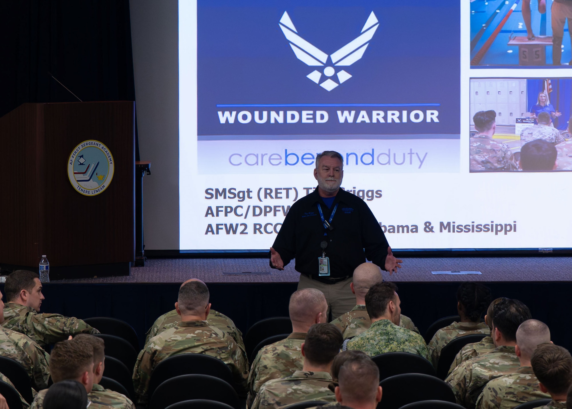 Retired Senior Master Sgt. Tim Griggs, Air Force Wounded Warrior recovery care coordinator, delivers a presentation on the AFW2 program at Gunter Annex, Alabama, March 3, 2026.