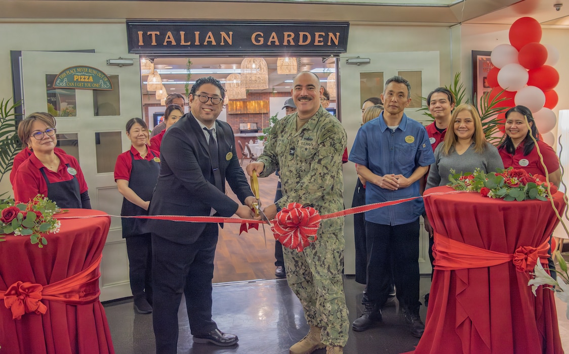 YOKOSUKA, Japan (March 2, 2026) – Capt. Jonathan Hopkins and Club Manager Asa Yamashita cut the ribbon during the reopening ceremony for Italian Gardens at Commander, Fleet Activities Yokosuka, March 2, 2026. The restaurant reopened following renovations conducted February 1 to March 1 that introduced updated flooring, lighting, and a new open concept layout to enhance dining and community events. The improvements support morale, retention, and readiness by strengthening quality of life programs for service members and their families. (U.S. Navy photo by Sheryl Sullivan)