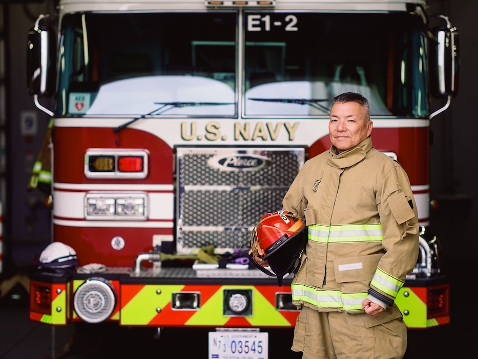 FLEET ACTIVITIES YOKOSUKA, Japan (March 3, 2026) -- Katsuhiro Watanabe, a crew chief from Commander, Navy Region Japan (CNRJ) Fire & Emergency Services onboard Commander, Fleet Activities Yokosuka (CFAY), was named the Commander, Navy Installations Command (CNIC) Civilian Firefighter of the Year for 2025 Friday, February 27. Watanabe is in his 40th year of service at the department where he started when he was just 19-years-old. Watanabe led responses to over 500 incidents and spearheaded critical training initiatives for both enlisted and civilian firefighters while serving as crew chief. His efforts forged stronger U.S.-Japan integrated response teams and safeguarded more than $4.5 billion worth of 7th Fleet assets. (U.S. Navy photo by James Kimber)