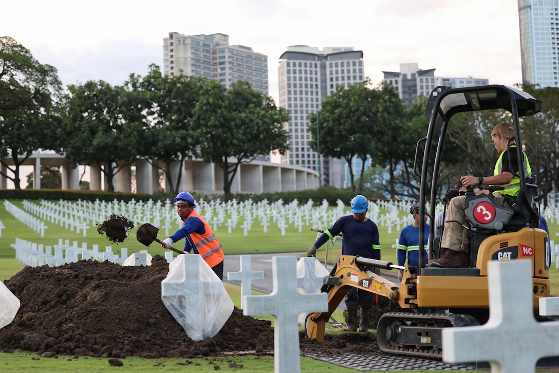 Staff members of the Manila American Cemetery and Memorial in the Philippines assist the Defense POW/MIA Accounting Agency in disinterring the potential remains of U.S. personnel who remain unaccounted for from World War II, March 4, 2026.