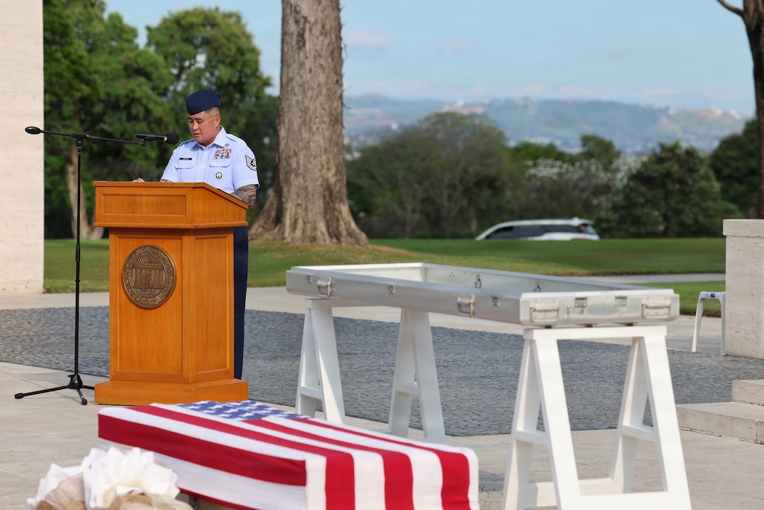 U.S. Air Force Tech. Sgt. Michael Castro, Defense POW/MIA Accounting Agency Operations Law noncommissioned officer-in-charge, and master of ceremony, welcomes guests to the first-ever Repatriation Ceremony held at the Manila American Cemetery and Memorial in the Philippines for U.S. personnel who were disinterred there, March 6, 2026.