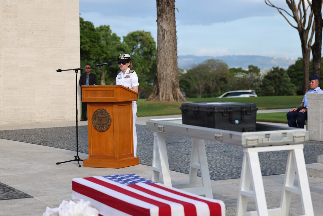 U.S. Navy Capt. Meghan Bodnar, Defense POW/MIA Accounting Agency deputy director for operations, delivers remarks during the first-ever Repatriation Ceremony held at the Manila American Cemetery and Memorial in the Philippines for U.S. personnel who were disinterred there, March 6, 2026.