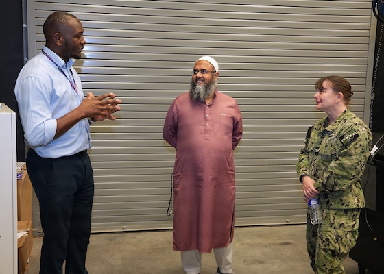 JOINT BASE SAN ANTONIO-FORT SAM HOUSTON – (March 4, 2026) – Research Scientists Drs. Dickson Kirui (left) and Abu Mitul, research scientists assigned to Naval Medical Research Unit (NAMRU) San Antonio’s Directed Energy Health Effects directorate, briefs Capt. Kris Hodapp, deputy Corps Chief, Medical Service Corps (MSC), during a visit to the Tri-Service Research Laboratory. During the visit, Hodapp, joined by Capt. Bryan Pyle, MSC Policy and Practice officer, toured research laboratories at TSRL and conducted independent record reviews with MSC officers. Additionally, they gave a State of the MSC briefing with emphasis on Navy Medicine’s North Star and Lines of Effort. Other areas of briefing included career progression, community values, manpower, promotion trends, and maintaining accuracy of military records. The MSC mission is to provide specialized healthcare, administrative, and scientific support to Naval forces, maximizing operational readiness and optimizing the "human weapon system". Comprised of professionals in clinical, scientific, and administrative fields, the MSC supports Navy Medicine’s mission to deliver manned, trained, and equipped medical units to the Fleet, Fleet Marine Force, and Joint Forces. NAMRU San Antonio, part of Navy Medicine Research & Development, conducts gap-driven combat casualty care, craniofacial, and directed energy research in support of Navy, Marine Corps and joint U.S. warfighter health readiness and lethality while engaged in routine and expeditionary operations. (Navy Photo by Burrell Parmer, NAMRU San Antonio Public Affairs/Released)