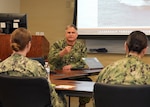 JOINT BASE SAN ANTONIO-FORT SAM HOUSTON – (March 4, 2026) – U.S. Navy Capt. Bryan Pyle, Medical Service Corps (MSC) Policy and Practice officer, gave a State of the MSC brief to MSC officers assigned to Naval Medical Research Unit (NAMRU) San Antonio at the Tri-Service Research Laboratory (TSRL). With an emphasis on Navy Medicine’s North Star and Lines of Effort, the briefing focused on career progression, community values, manpower, promotion trends, and maintaining accuracy of military records. Prior to the briefing, they met with NAMRU San Antonio leadership, toured the command’s research laboratories and conducted independent record reviews with each MSC officer. The MSC mission is to provide specialized healthcare, administrative, and scientific support to Naval forces, maximizing operational readiness and optimizing the 