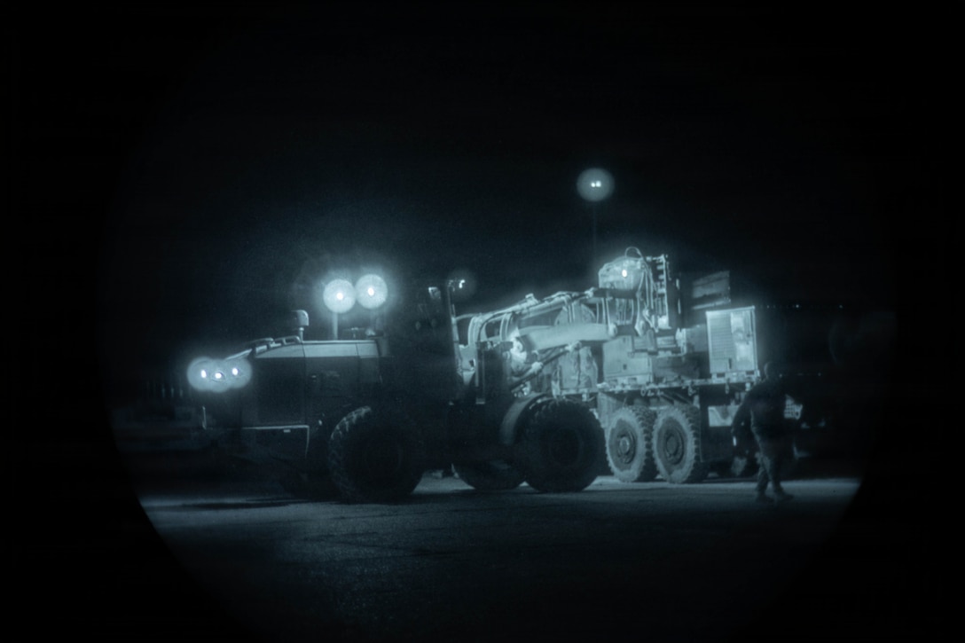 U.S. Marine Corps Sgt. Boman Allen Jr., a platoon sergeant with Combat Logistics Battalion 8, 24th Marine Expeditionary Unit, offloads equipment with a 624-KR Tractor Rubber-tire Articulating Multipurpose vehicle during an evacuation control center set up in preparation for a non-combatant evacuation operation scenario as part of the MEU’s certification exercise at Marine Corps Outlying Landing Field Atlantic, North Carolina, Feb. 23, 2026. CERTEX is a land-based pre-deployment exercise that enhances the integration and collective capability of the Marine Air-Ground Task Force while providing the 24th MEU with an opportunity to train and execute operations in austere and urban environments. (U.S. Marine Corps photo by Sgt. Daniel Childs)