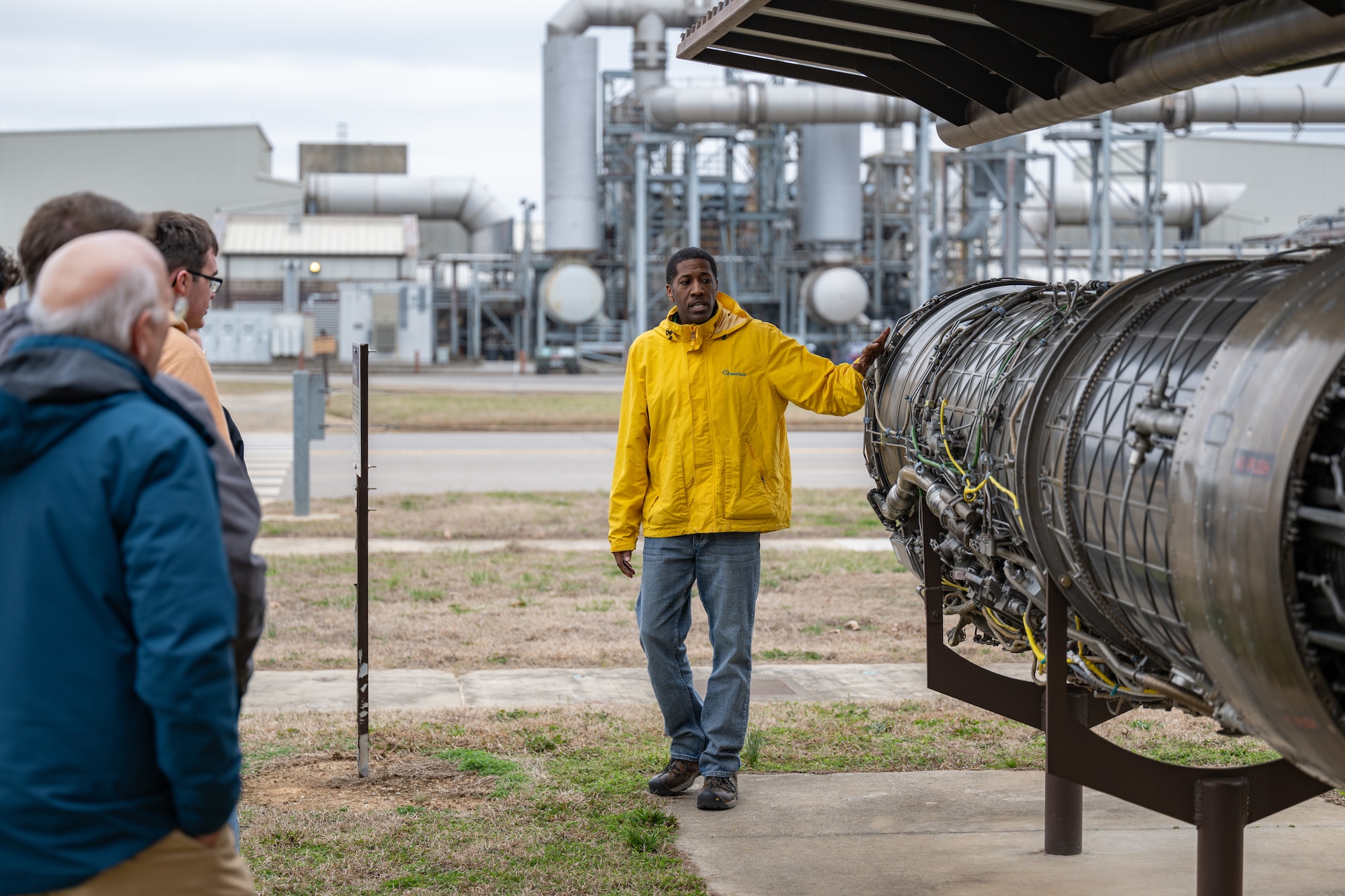 Technical and Management Advisory Service Propulsion Test Supervisor Jeremy Morris briefs Engineer-For-A-Day participants on a F-100 engine located outside of the Engine Test Facility, or ETF for the 2026 Engineer-For-A-Day program at Arnold Air Force Base, Tenn., headquarters of Arnold Engineering Development Complex, Feb. 25, 2026. Area high school students were able to tour facilities as a part of the day’s activities to further their understanding of the base and its facilities.  (U.S. Air Force Photo by Keith Thornburgh)