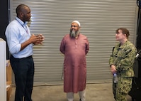 JOINT BASE SAN ANTONIO-FORT SAM HOUSTON – (March 4, 2026) – Research Scientists Drs. Dickson Kirui (left) and Abu Mitul, research scientists assigned to Naval Medical Research Unit (NAMRU) San Antonio’s Directed Energy Health Effects directorate, briefs Capt. Kris Hodapp, deputy Corps Chief, Medical Service Corps (MSC), during a visit to the Tri-Service Research Laboratory. During the visit, Hodapp, joined by Capt. Bryan Pyle, MSC Policy and Practice officer, toured research laboratories at TSRL and conducted independent record reviews with MSC officers. Additionally, they gave a State of the MSC briefing with emphasis on Navy Medicine’s North Star and Lines of Effort. Other areas of briefing included career progression, community values, manpower, promotion trends, and maintaining accuracy of military records. The MSC mission is to provide specialized healthcare, administrative, and scientific support to Naval forces, maximizing operational readiness and optimizing the "human weapon system". Comprised of professionals in clinical, scientific, and administrative fields, the MSC supports Navy Medicine’s mission to deliver manned, trained, and equipped medical units to the Fleet, Fleet Marine Force, and Joint Forces. NAMRU San Antonio, part of Navy Medicine Research & Development, conducts gap-driven combat casualty care, craniofacial, and directed energy research in support of Navy, Marine Corps and joint U.S. warfighter health readiness and lethality while engaged in routine and expeditionary operations. (Navy Photo by Burrell Parmer, NAMRU San Antonio Public Affairs/Released)
