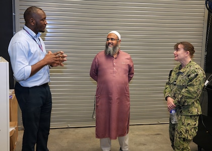 JOINT BASE SAN ANTONIO-FORT SAM HOUSTON – (March 4, 2026) – Research Scientists Drs. Dickson Kirui (left) and Abu Mitul, research scientists assigned to Naval Medical Research Unit (NAMRU) San Antonio’s Directed Energy Health Effects directorate, briefs Capt. Kris Hodapp, deputy Corps Chief, Medical Service Corps (MSC), during a visit to the Tri-Service Research Laboratory. During the visit, Hodapp, joined by Capt. Bryan Pyle, MSC Policy and Practice officer, toured research laboratories at TSRL and conducted independent record reviews with MSC officers. Additionally, they gave a State of the MSC briefing with emphasis on Navy Medicine’s North Star and Lines of Effort. Other areas of briefing included career progression, community values, manpower, promotion trends, and maintaining accuracy of military records. The MSC mission is to provide specialized healthcare, administrative, and scientific support to Naval forces, maximizing operational readiness and optimizing the "human weapon system". Comprised of professionals in clinical, scientific, and administrative fields, the MSC supports Navy Medicine’s mission to deliver manned, trained, and equipped medical units to the Fleet, Fleet Marine Force, and Joint Forces. NAMRU San Antonio, part of Navy Medicine Research & Development, conducts gap-driven combat casualty care, craniofacial, and directed energy research in support of Navy, Marine Corps and joint U.S. warfighter health readiness and lethality while engaged in routine and expeditionary operations. (Navy Photo by Burrell Parmer, NAMRU San Antonio Public Affairs/Released)