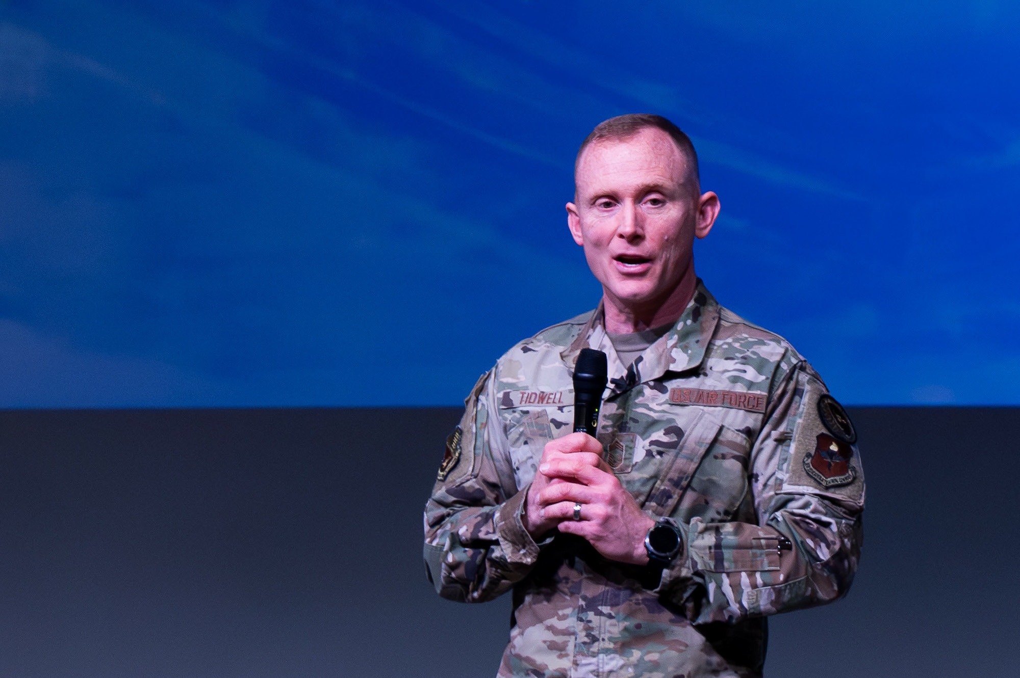 U.S. Air Force Chief Master Sgt. Joshua R. Tidwell, Senior Noncommissioned Officer Academy commandant, addresses students from Squadron Officer School and the Senior Noncommissioned Officer Academy during a combined operations welcome at Maxwell Air Force Base, Alabama, March 5, 2026. (U.S. Air Force photo by Airman 1st Class Nelvis Sera)
