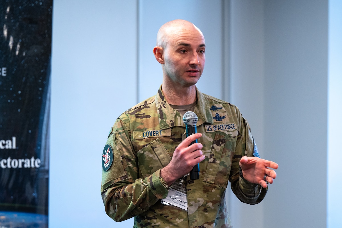 Image of a Guardian talking to a crowd.
