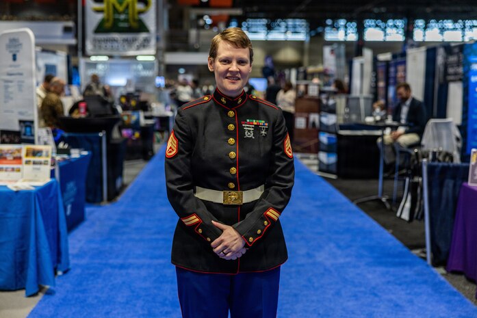 U.S Marine Corps Staff Sgt. Lucy Warmbrodt, a Musician Technical Assistant with 9th Marine Corps District, poses for a photo at Chicago’s Midwest Clinic in Chicago, Illinois, Dec. 19, 2025. The Midwest Clinic is one of the largest music conferences in the Nation and Marines from the Drum and Bugle Corps, Marine Corps Recruiting Command, and various members of other Marine Corps Bands from across the world attended, to include the President’s Own. (U.S. Marine Corps photo by Cpl. Maxwell Cook)