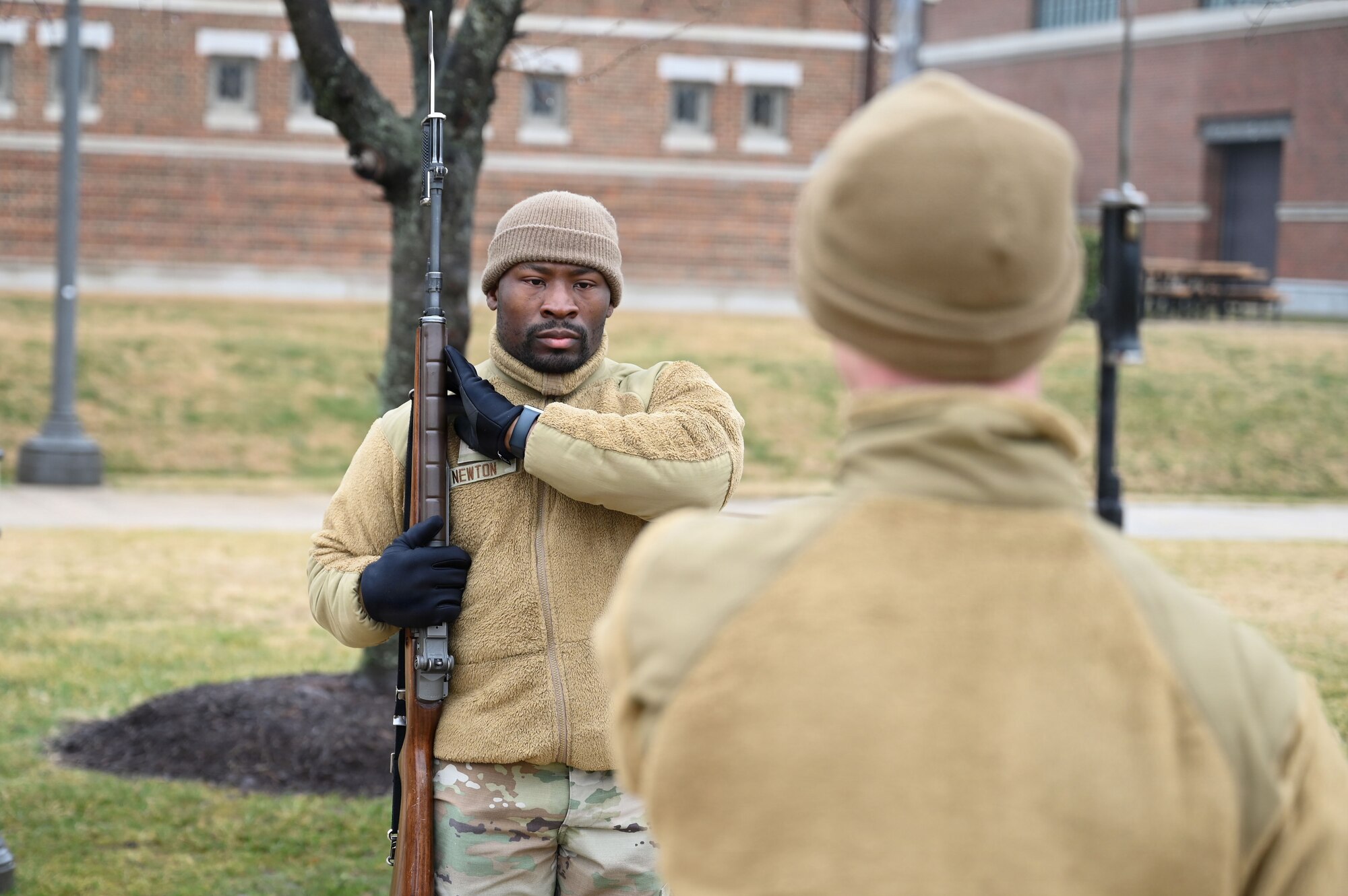 Airman 1st Class Ricky Newton, a ceremonial guardsman with the U.S. Air Force Honor Guard Firing Party, conducts drill movements during training on Joint Base Anacostia-Bolling, Washington, D.C., March 3, 2026. The Firing Party trained on memorial honors, with one element of those honors the firing of three rifle volleys during funeral services at Arlington National Cemetery. (U.S. Air Force photo by Airman 1st Class Brandon Thomas)