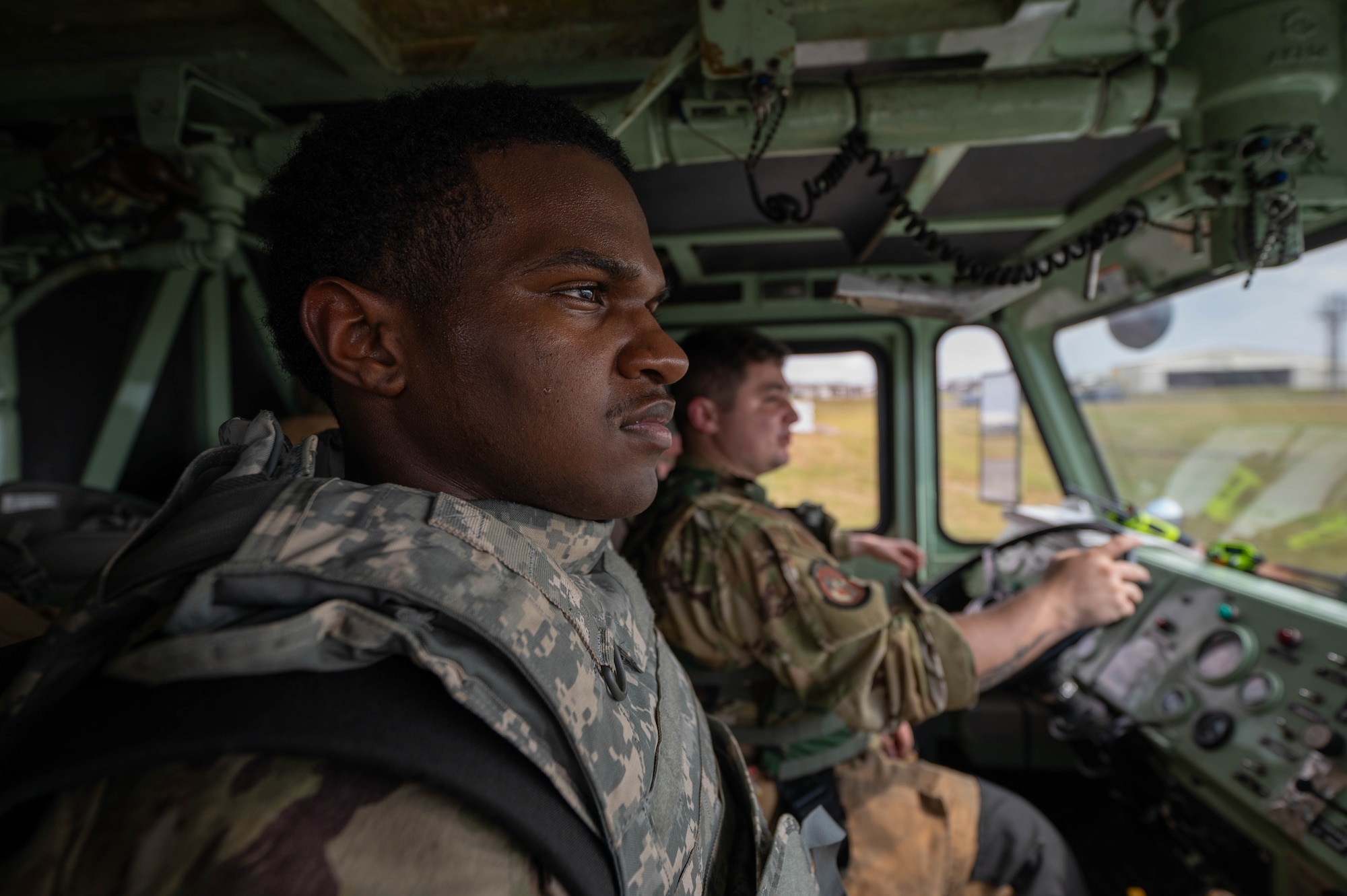 U.S. Air Force Airman 1st Class Nasir Medina, 18th Civil Engineer Squadron firefighter, looks ahead during U.S. Air Force-led operational exercise Beverly Midnight 26 at Kadena Air Base, Japan, Mar 10, 2026. Training events like this improve coordination and readiness across allied forces in the Indo-Pacific. (U.S. Air Force photo by Airman 1st Class Francisco Huerta)