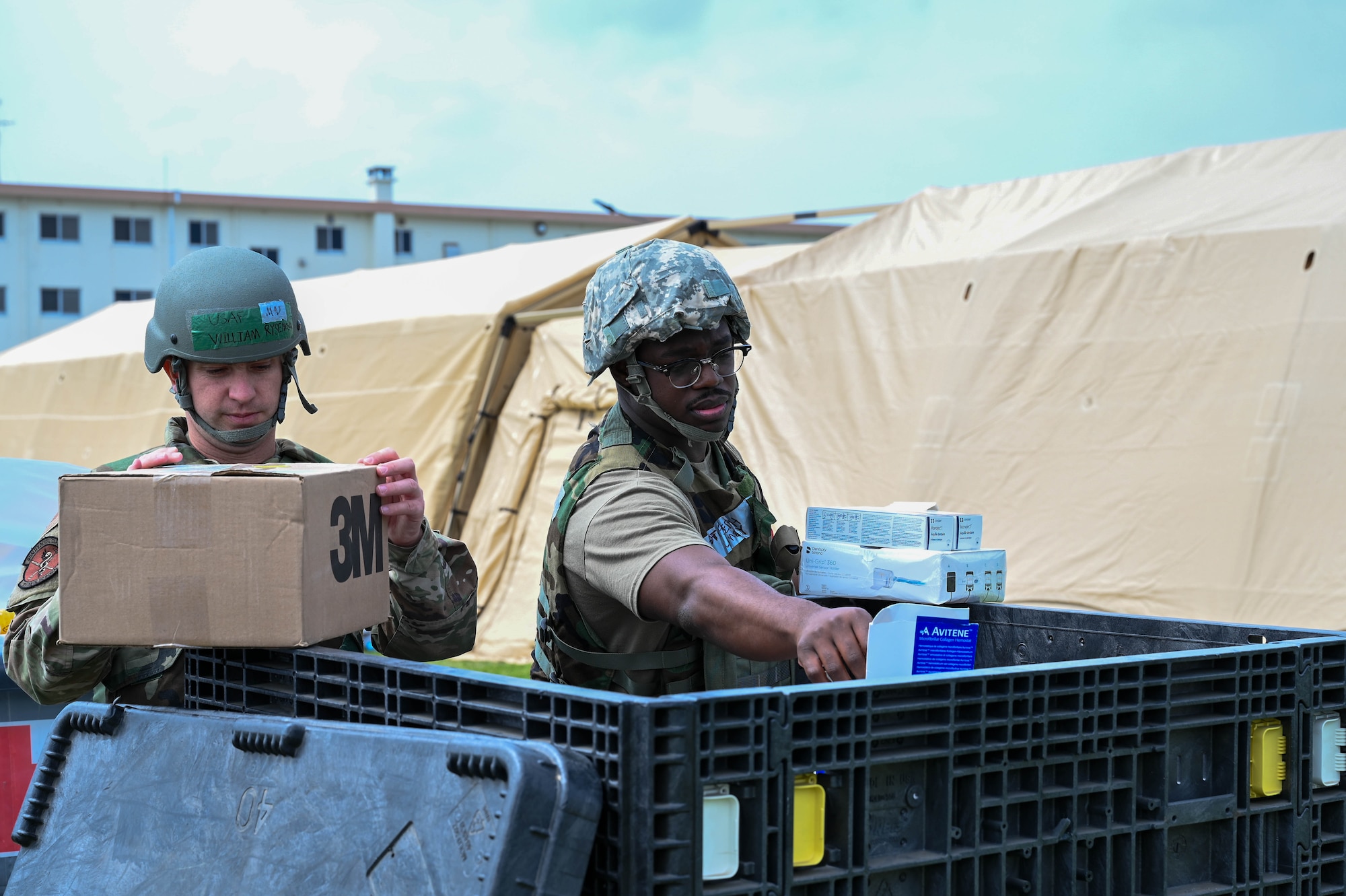 U.S. Air Force Maj. William Rysenga, left, 18th Dental Squadron general dentist and Tech. Sgt. Joseph Linzy, 18th DS dental technician, sorted through medical supplies during an USAF-led operational readiness exercise, Beverley Midnight 2026, at Kadena Air Base, Japan, March 10, 2026.